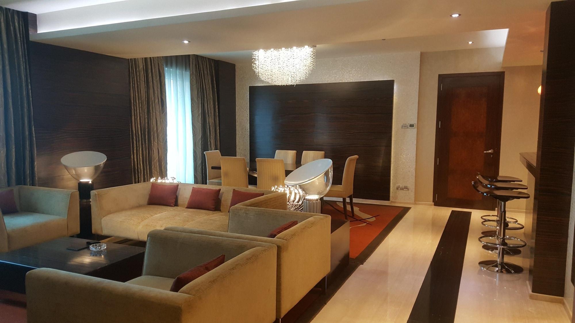Vivanta Hyderabad, Begumpet Екстериор снимка A living room in a suite at the Ritz-Carlton, DIFC