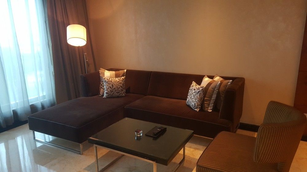 Vivanta Hyderabad, Begumpet Екстериор снимка A living room in a suite at the Ritz-Carlton, Kuala Lumpur